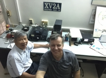 My friend Alex KU1CW with Nguyen Bac At XV2A  Nguyen's station